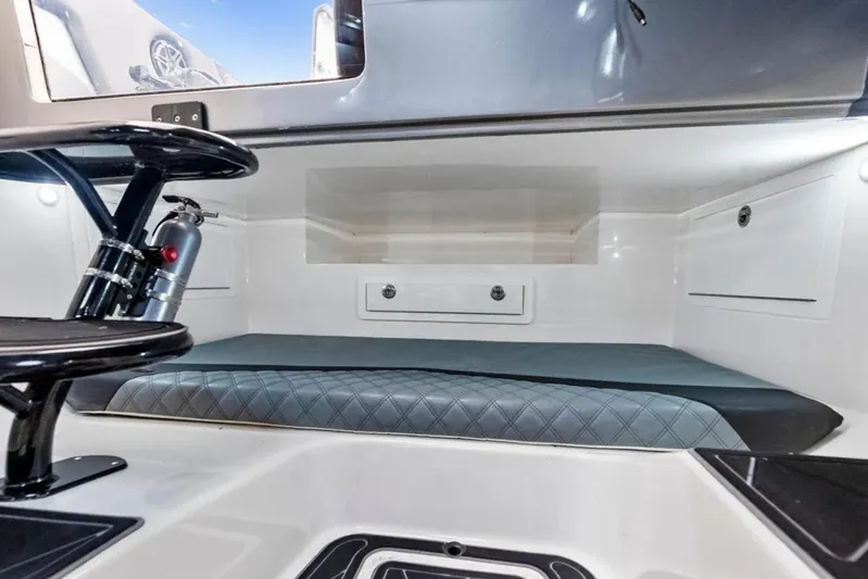  Yacht Photos Pics Forward cabin interior of 2027 Deep Impact 399, featuring sleek design and modern amenities.