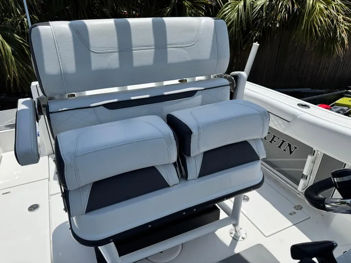  Yacht Photos Pics 2021 Blackfin 252 CC boat seating with cushioned armrests and sleek design.