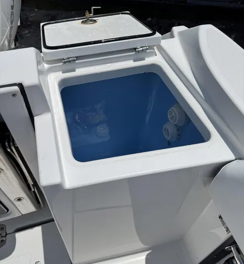  Yacht Photos Pics Open storage compartment on a 2021 Blackfin 252 CC boat.