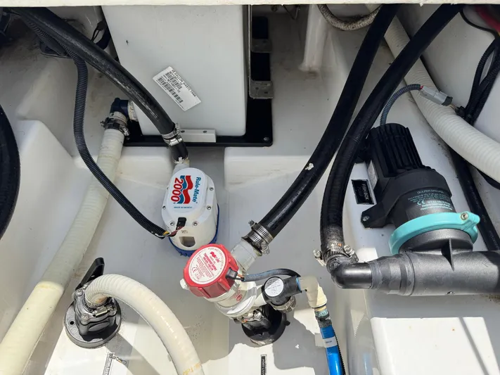  Yacht Photos Pics Bilge area of 2021 Blackfin 252 CC boat with pumps and hoses.