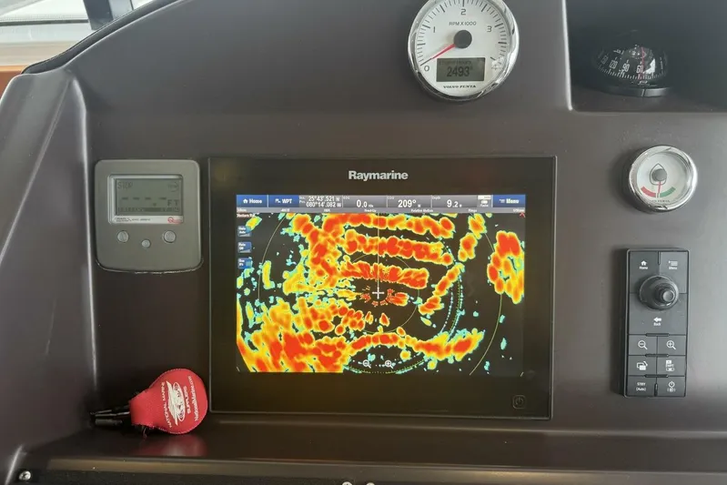 Balena Yacht Photos Pics Navigation dashboard of 2015 Beneteau Swift Trawler 50 with Raymarine display.
