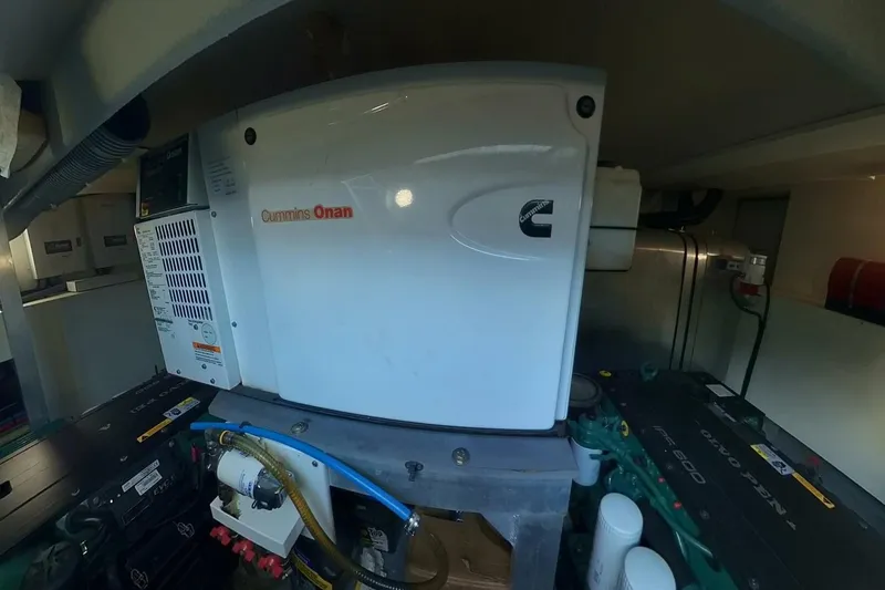 Balena Yacht Photos Pics Engine room of 2015 Beneteau Swift Trawler 50 with Cummins Onan generator.