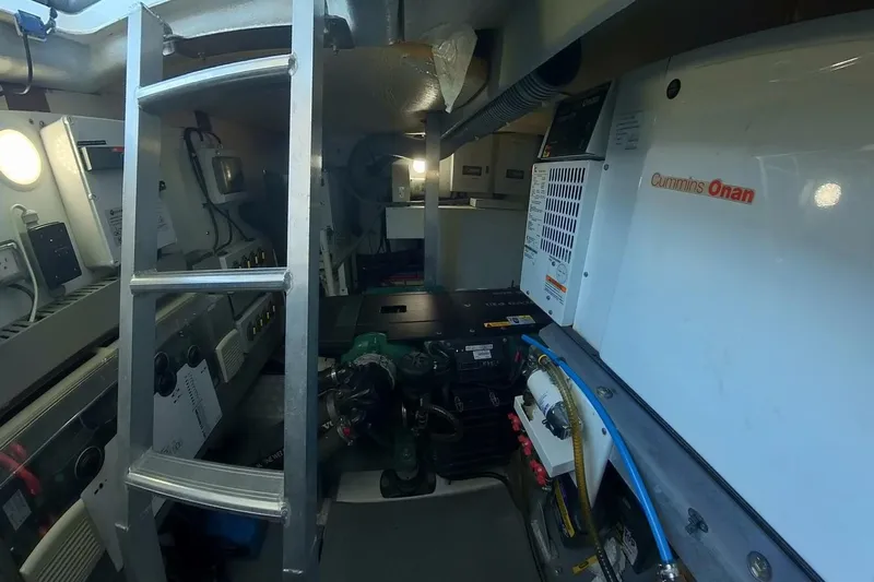Balena Yacht Photos Pics Engine room of 2015 Beneteau Swift Trawler 50 with Cummins Onan generator.