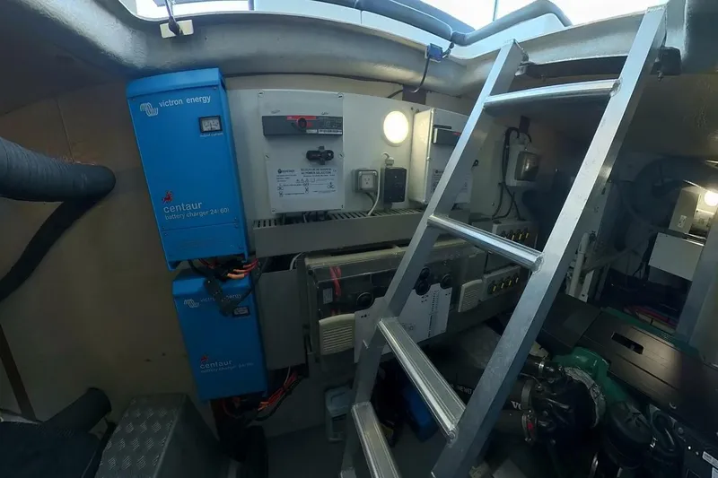 Balena Yacht Photos Pics Engine room of 2015 Beneteau Swift Trawler 50 with Victron Energy equipment and ladder.