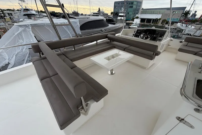  Yacht Photos Pics 2016 Leopard 51 Powercat yacht deck with seating and helm station.