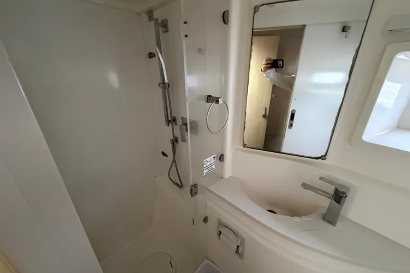  Yacht Photos Pics Bathroom interior of 2016 Leopard 51 Powercat with shower and sink.
