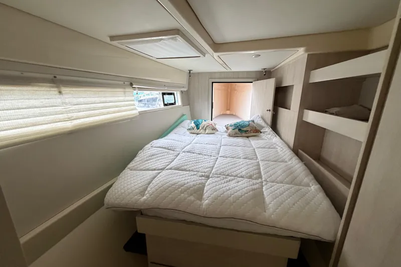  Yacht Photos Pics Interior cabin of 2016 Leopard 51 Powercat with cozy bed and modern design.