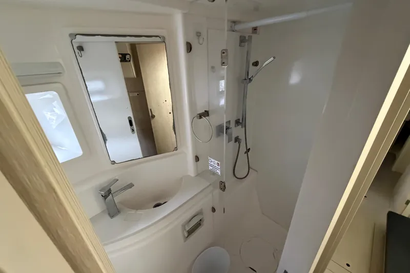  Yacht Photos Pics Bathroom interior of 2016 Leopard 51 Powercat yacht, featuring modern fixtures and shower.