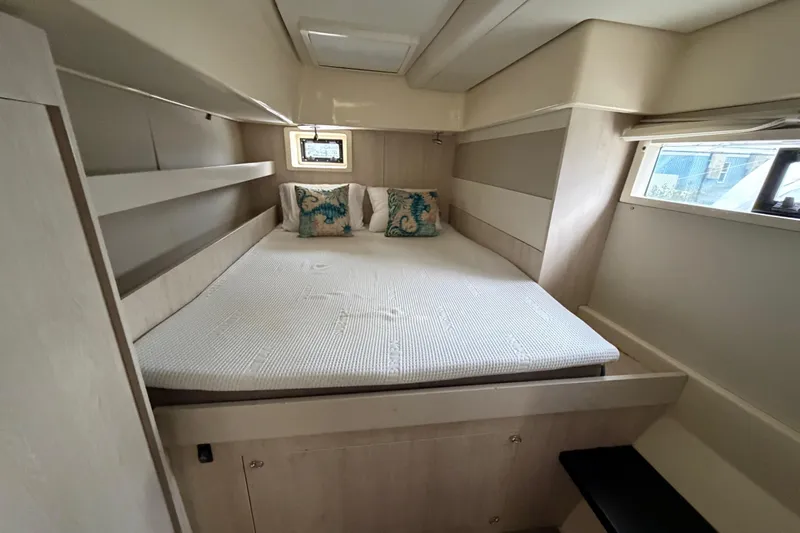  Yacht Photos Pics Cozy bedroom in 2016 Leopard 51 Powercat with double bed and decorative pillows.