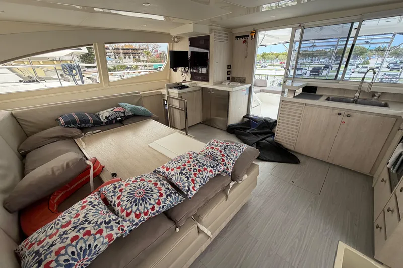  Yacht Photos Pics Luxurious interior of 2016 Leopard 51 Powercat with modern kitchen and cozy seating area.