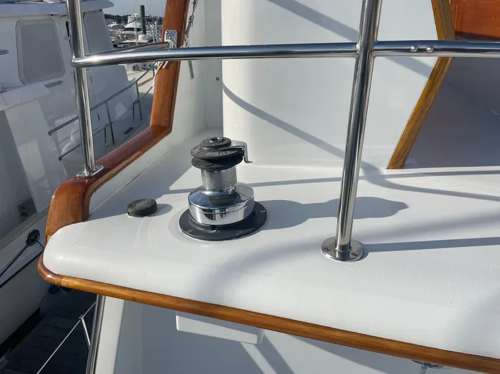 Southerly Yacht Photos Pics Deck of 1990 Lyman-Morse 52 yacht with winch and polished railings.