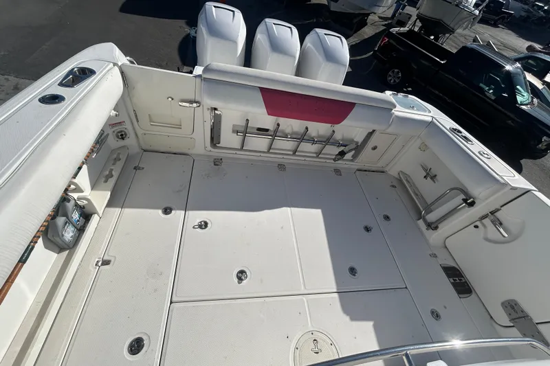 Tt Virtue Yacht Photos Pics 2012 Boston Whaler 370 Outrage boat deck with storage and seating.