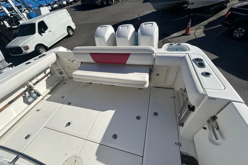 Tt Virtue Yacht Photos Pics 2012 Boston Whaler 370 Outrage boat interior with seating and storage compartments.