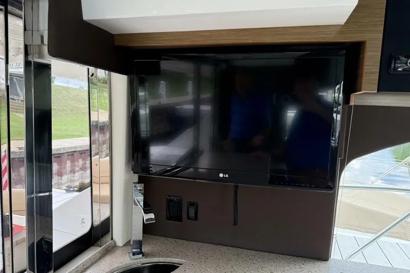  Yacht Photos Pics Interior of 2013 Cruisers Yachts Cantius with LG TV and modern design.