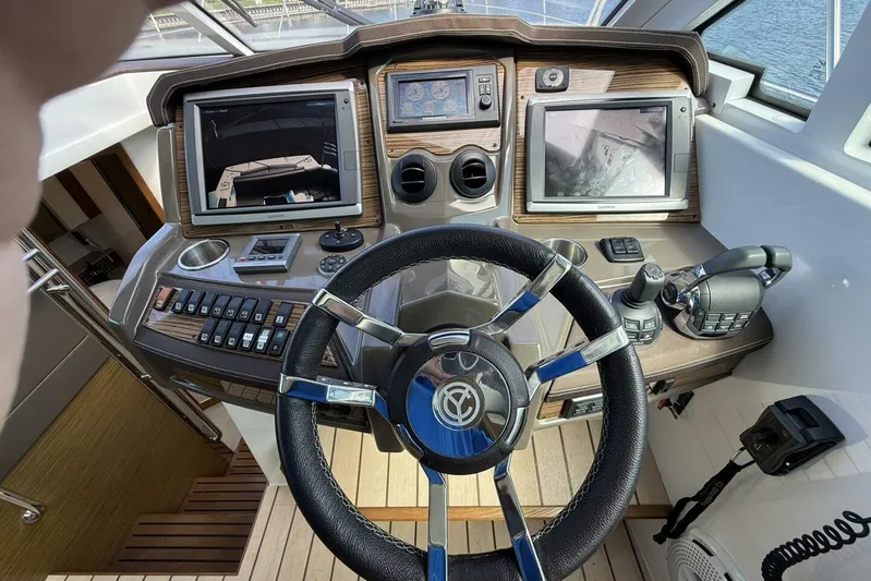  Yacht Photos Pics 2013 Cruisers Yachts Cantius helm with advanced navigation and control systems.