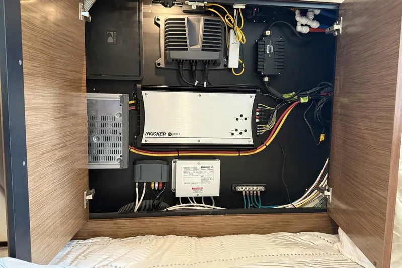  Yacht Photos Pics Electrical panel inside 2013 Cruisers Yachts Cantius, featuring wiring and components.