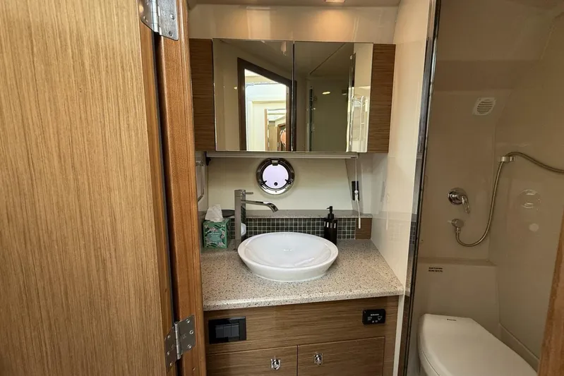  Yacht Photos Pics Luxurious 2013 Cruisers Yachts Cantius bathroom with modern fixtures and elegant design.