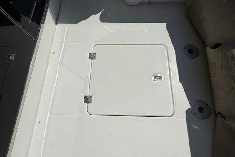  Yacht Photos Pics 2013 Cruisers Yachts Cantius deck hatch with secure latches and seating area.