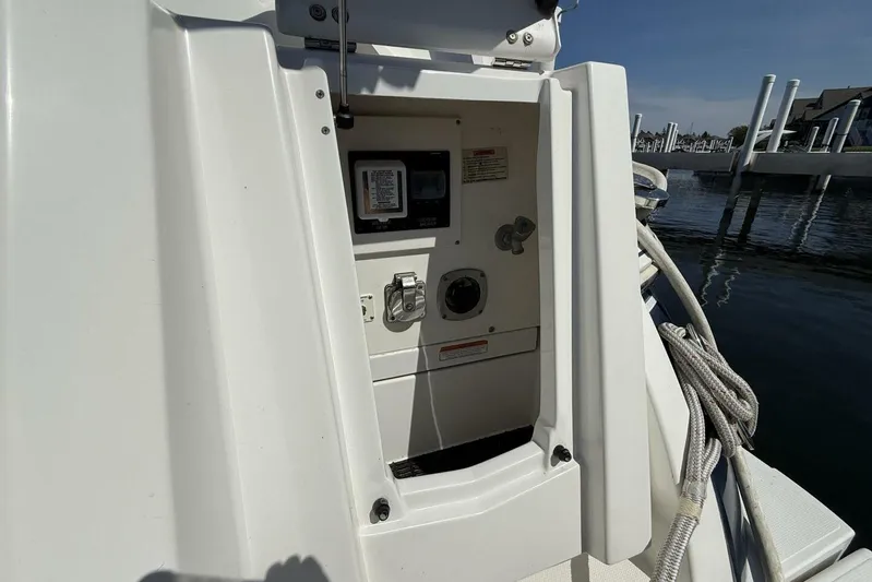  Yacht Photos Pics 2013 Cruisers Yachts Cantius electrical panel with marina view.