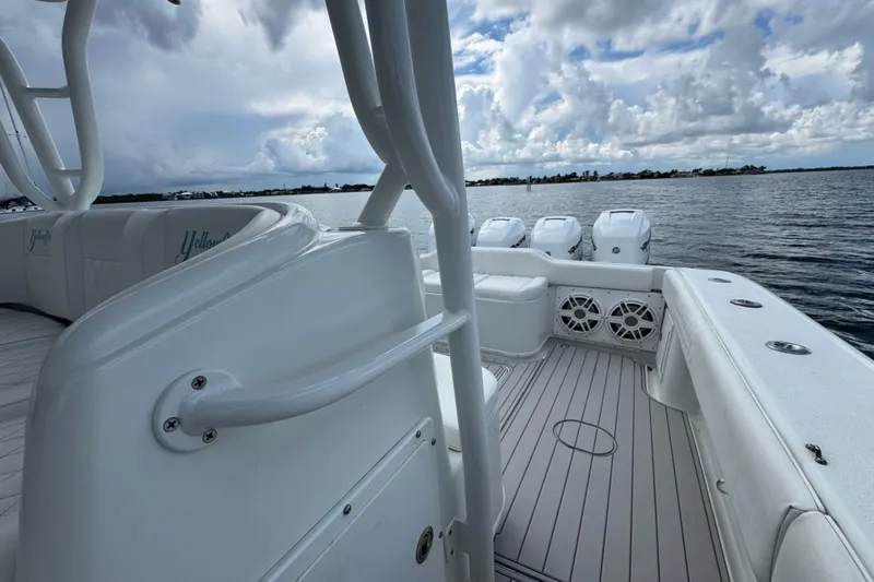  Yacht Photos Pics 2009 Yellowfin 42 Offshore boat deck with seating and ocean view.