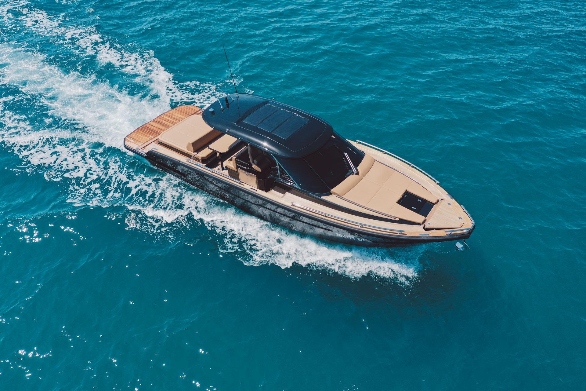 2025 Focus Forza 37 boat cruising on clear blue water.