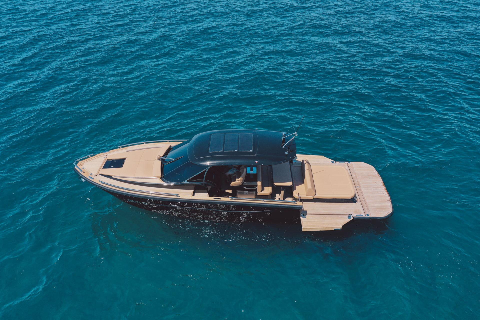 2025 Focus Forza 37 luxury boat cruising on clear blue water.