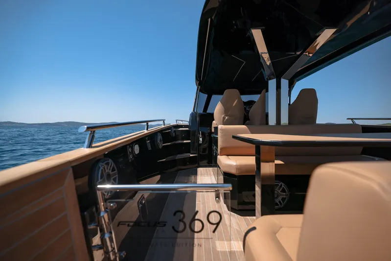  Yacht Photos Pics Luxurious 2025 Focus Forza 37 yacht interior with elegant seating and ocean view.