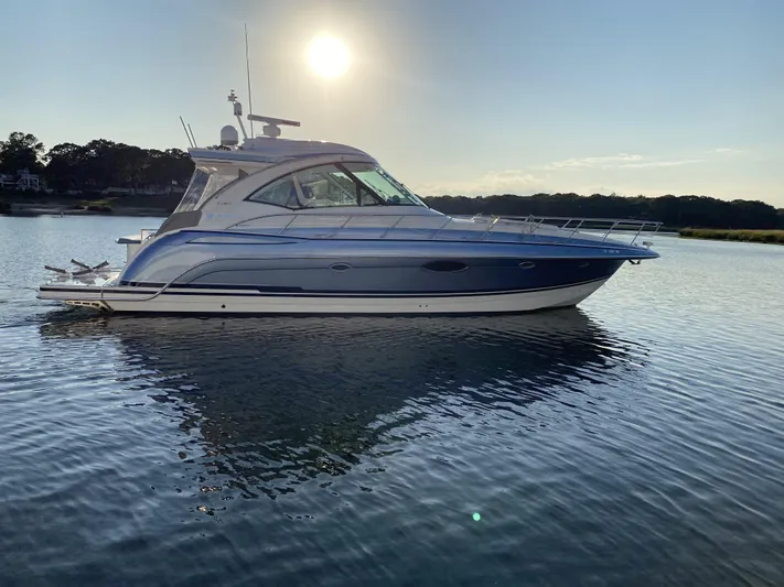  Yacht Photos Pics 2018 Formula 45 Yacht on calm water at sunset.