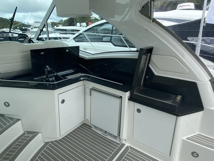  Yacht Photos Pics Interior of 2018 Formula 45 Yacht featuring modern kitchenette.