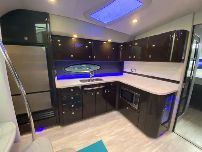  Yacht Photos Pics Modern kitchen in a 2018 Formula 45 Yacht with sleek lighting.