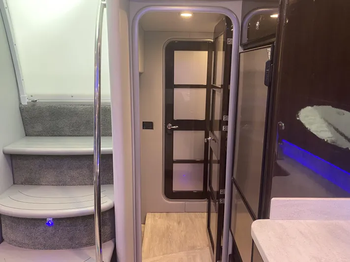  Yacht Photos Pics Interior of 2018 Formula 45 Yacht with stairs and door.