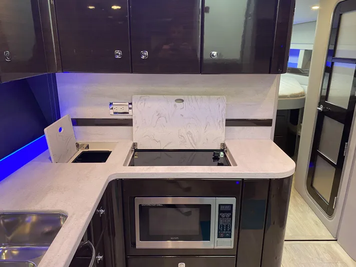  Yacht Photos Pics Interior of 2018 Formula 45 Yacht featuring modern kitchen.