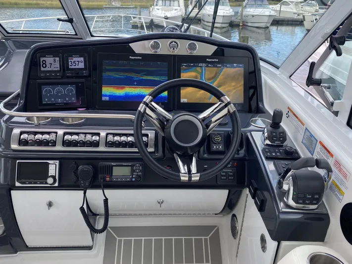  Yacht Photos Pics 2018 Formula 45 Yacht cockpit with modern navigation system.