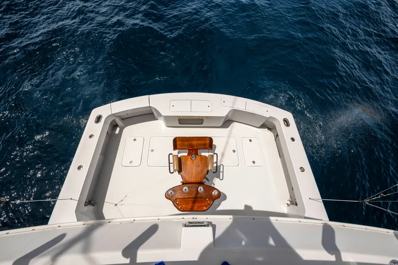 Strictly Business Yacht Photos Pics 2004 Hatteras 65 Enclosed Bridge yacht deck overlooking the ocean.