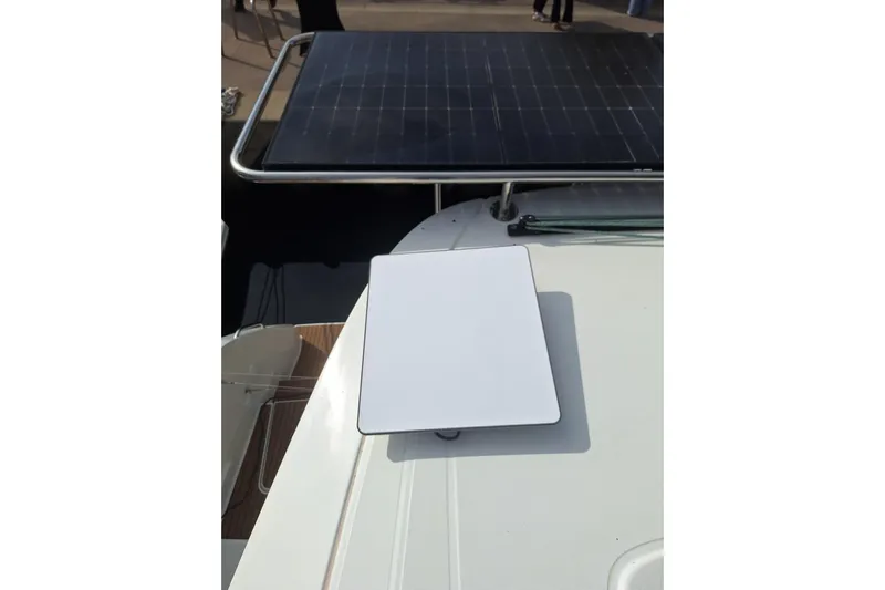 Yoff Yacht Photos Pics 2023 Lagoon 46 yacht with solar panel and satellite dish on deck.