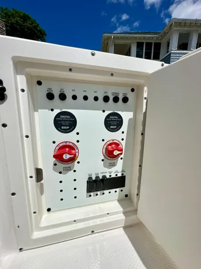  Yacht Photos Pics Control panel of 2024 Robalo R250 Center Console boat under clear blue sky.