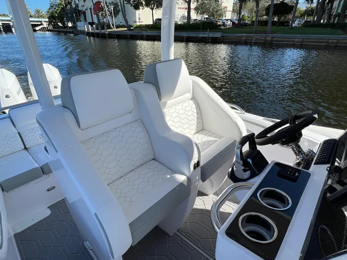  Yacht Photos Pics Luxury seating on the 2024 Airship 340 boat, featuring modern design and waterfront view.