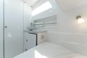  Yacht Photos Pics Interior cabin of 2025 Mag Bay 43 yacht with modern white design.