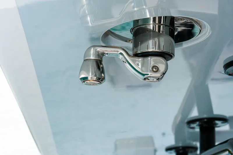  Yacht Photos Pics Close-up of a 2022 Jupiter 32 boat's chrome fixture detail.