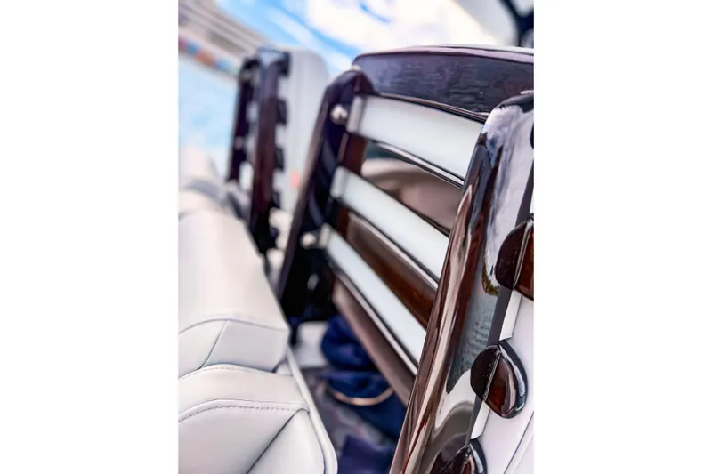  Yacht Photos Pics Luxury seating detail on 2022 Jupiter 32 boat, featuring sleek design and premium materials.