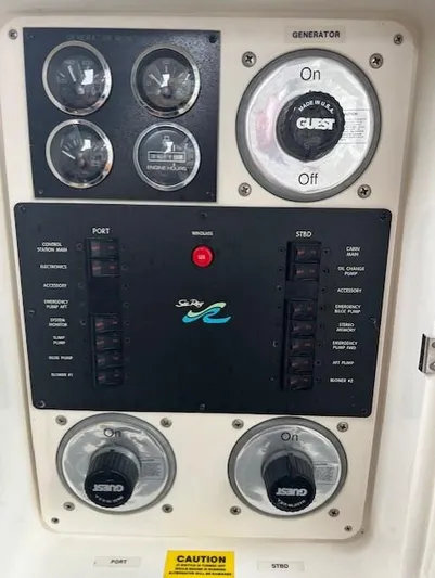  Yacht Photos Pics Control panel of a 1997 Sea Ray 400 Sundancer boat with gauges and switches.