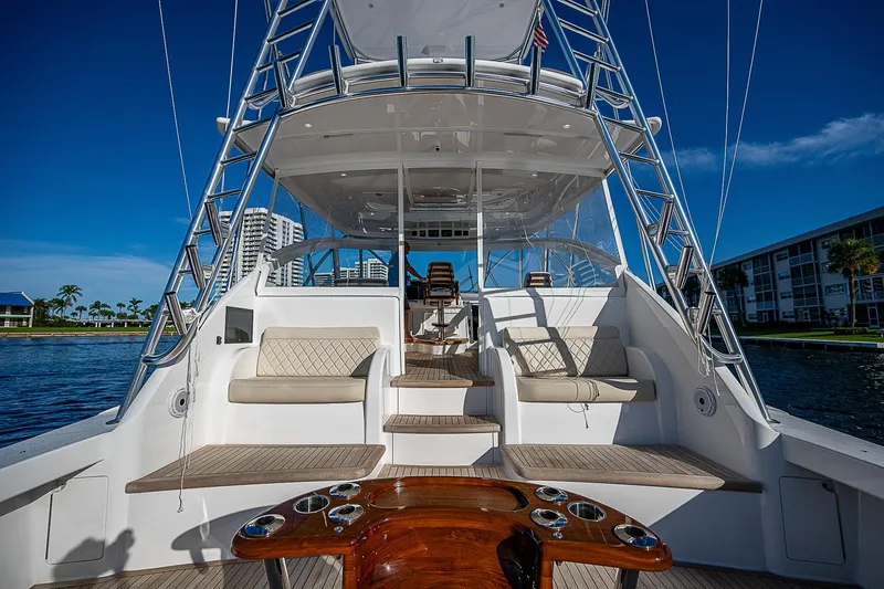  Yacht Photos Pics 2023 Viking 54 Open yacht with spacious deck and seating area.