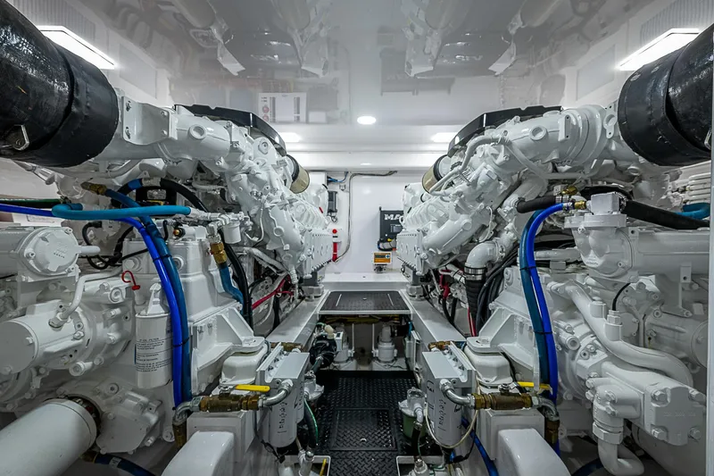  Yacht Photos Pics Engine room of 2023 Viking 54 Open yacht, showcasing advanced machinery and systems.