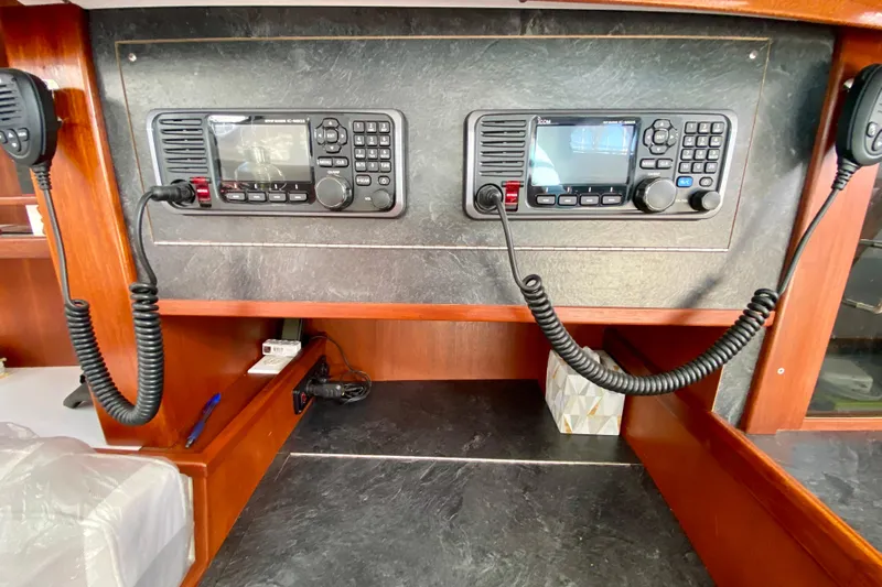 Wonder Yacht Photos Pics Radio equipment on a 1980 Wellington 44 boat, featuring dual communication systems.