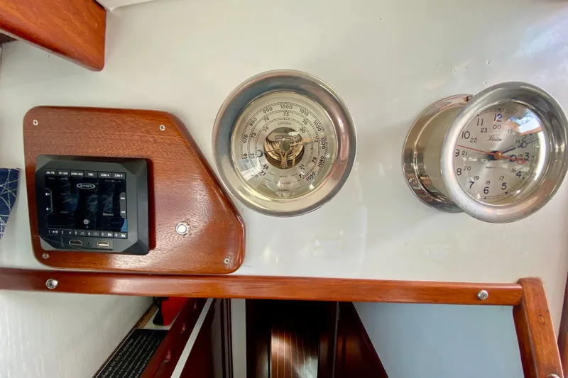 Wonder Yacht Photos Pics Control panel and gauges inside a 1980 Wellington 44 boat cabin.