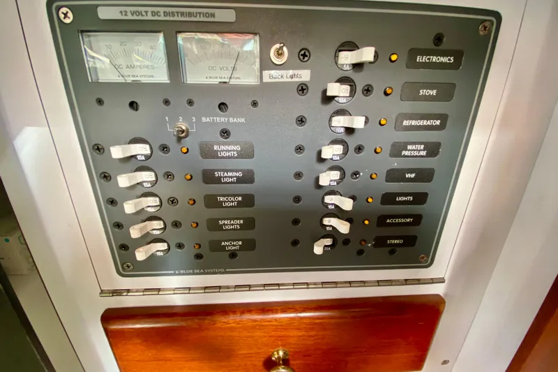 Wonder Yacht Photos Pics Electrical panel of a 1980 Wellington 44 boat with various switches and gauges.