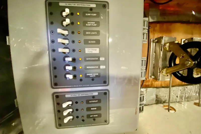 Wonder Yacht Photos Pics Electrical panel on a 1980 Wellington 44 boat with labeled switches and controls.