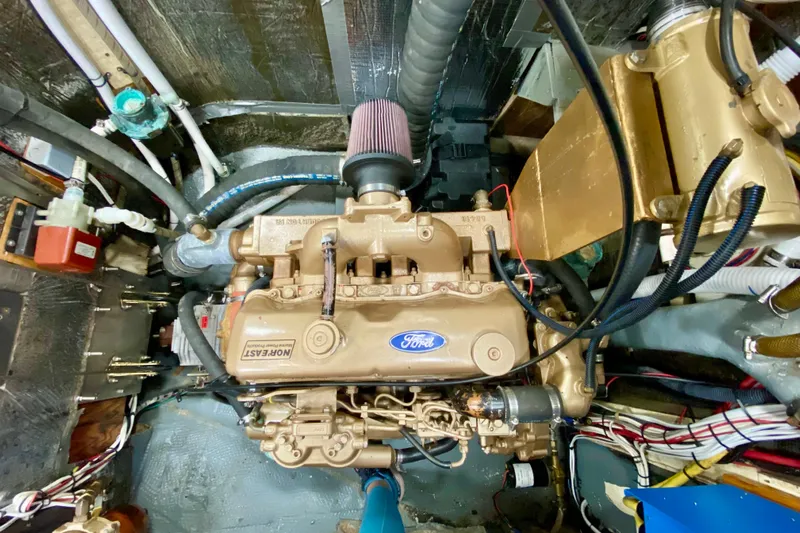 Wonder Yacht Photos Pics Engine room of a 1980 Wellington 44, featuring a Ford diesel engine.