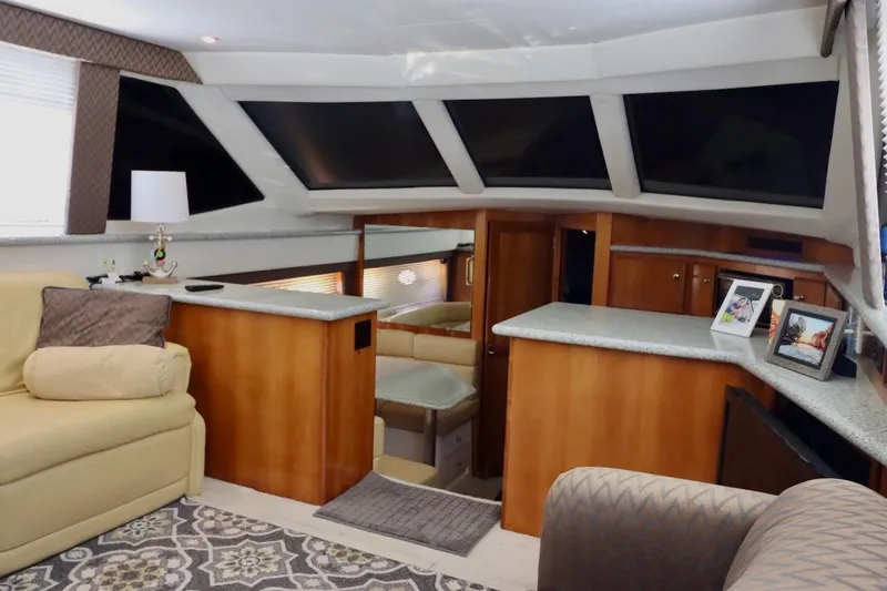 Grace Wins II Yacht Photos Pics Luxurious interior of a 2001 Carver 406 Motor Yacht with elegant furnishings.
