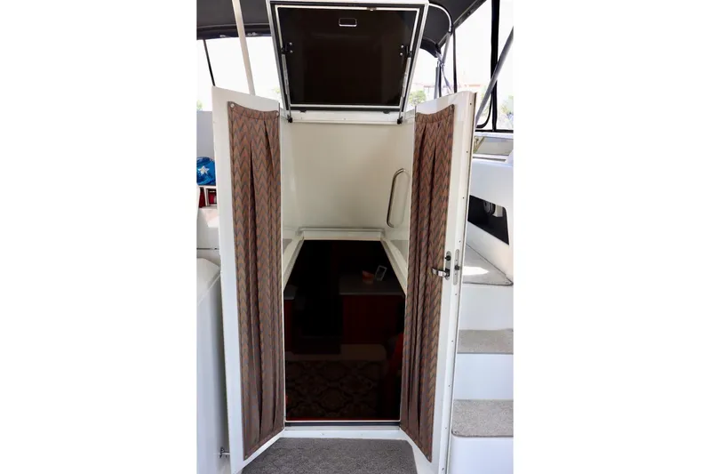 Grace Wins II Yacht Photos Pics Entrance to the cabin of a 2001 Carver 406 Motor Yacht with open doors.